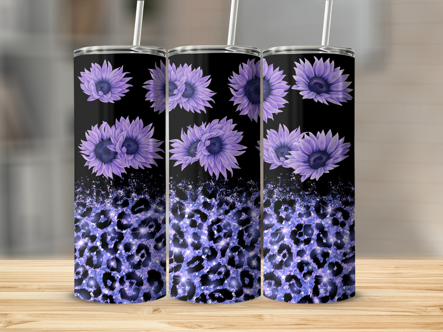 Purple sunflowers and leopard print pattern on three tumblers.