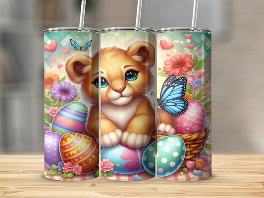 Cute lion cub with colorful Easter eggs and butterflies in a basket.