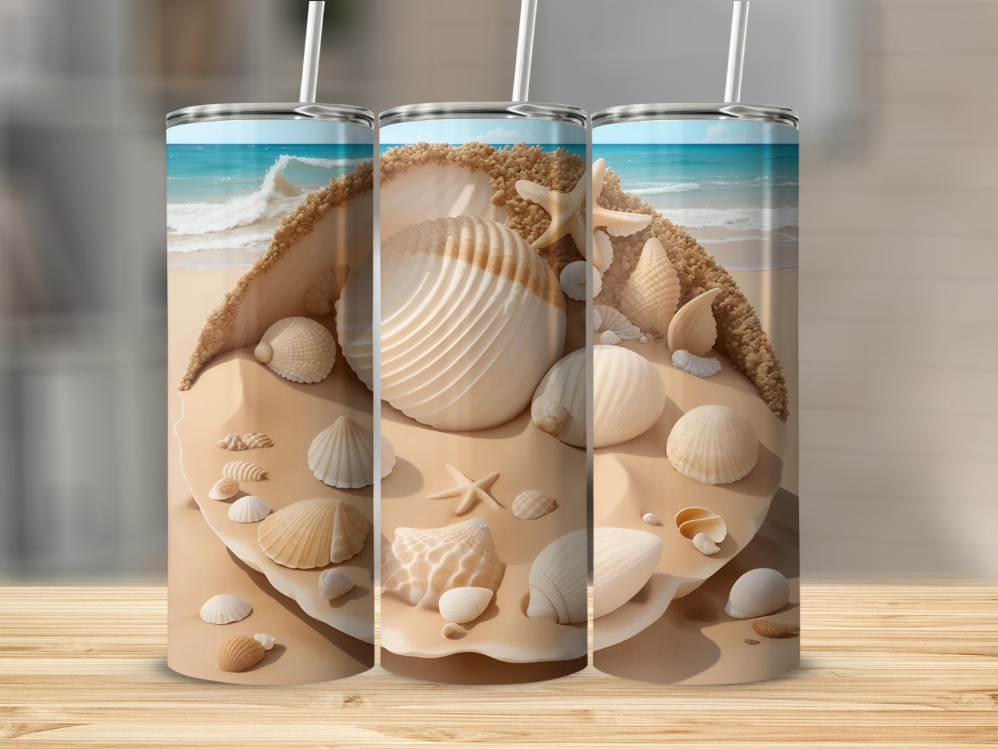 Three tumblers featuring a beach scene with seashells and starfish.
