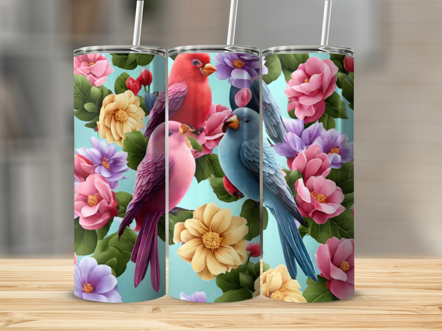 Three tumblers with floral and bird designs.