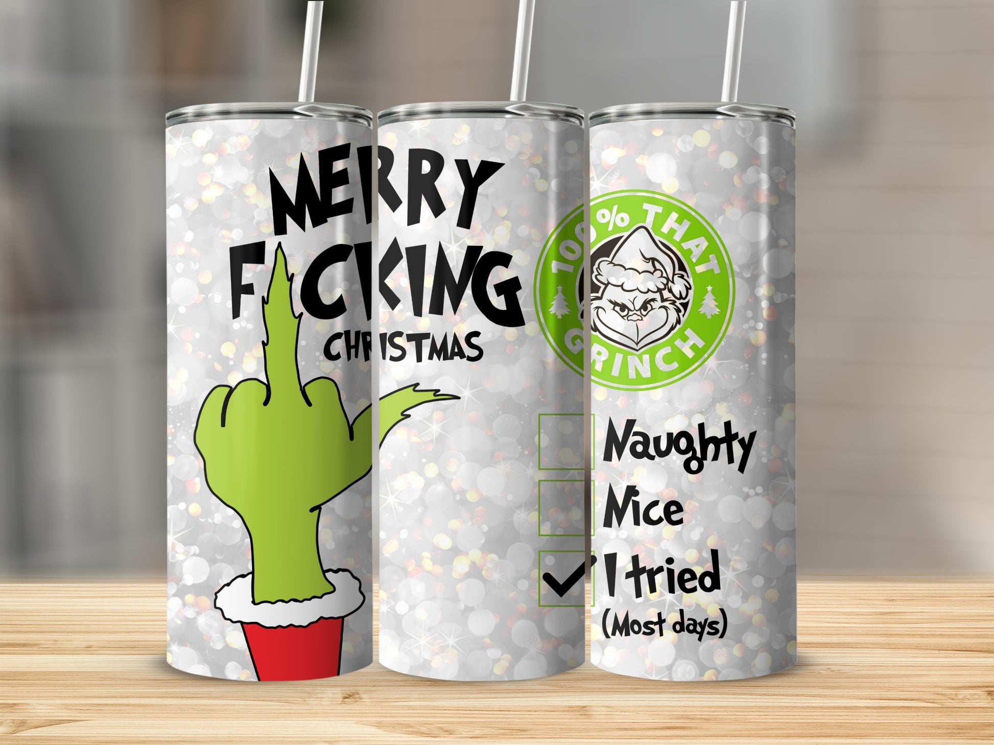 Tumbler with Grinch and "Merry Fucking Christmas" text.