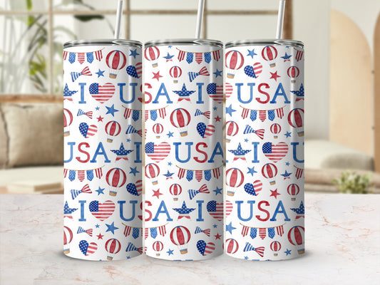 USA-themed tumbler with patriotic hearts, balloons, and stars pattern.