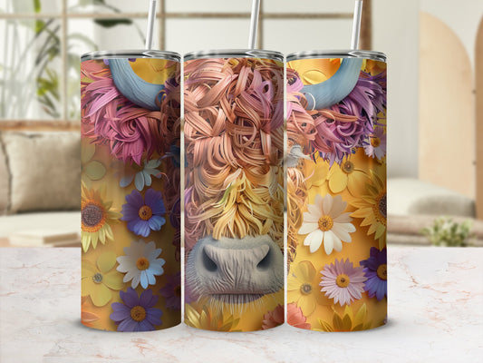 Highland cow with colorful floral accents on a tumbler.
