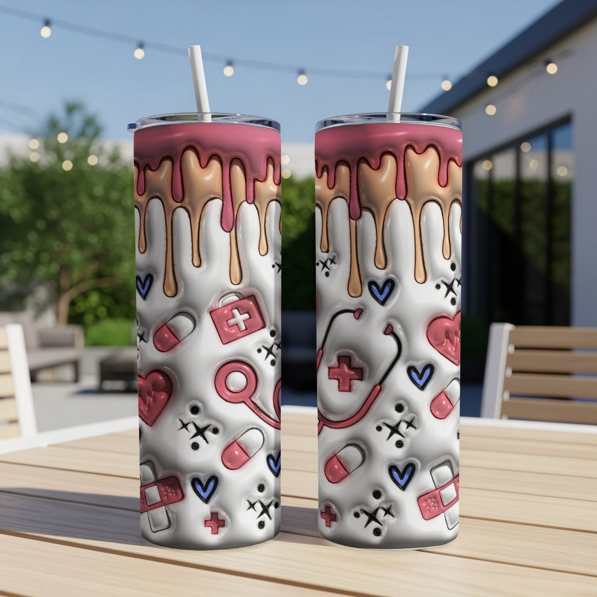 Two tall tumblers with pink dripping accents and medical icons.