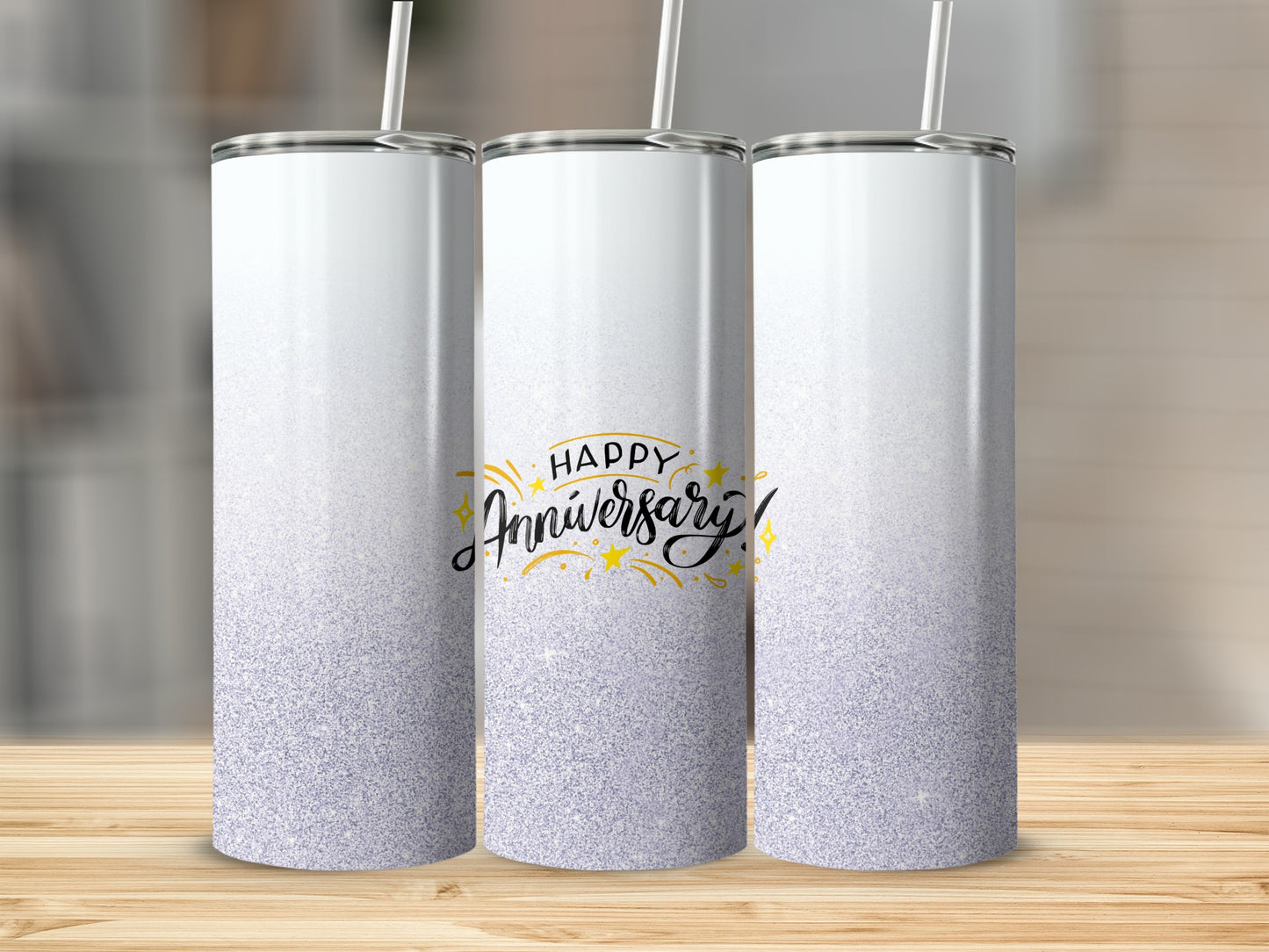 Tumbler with "Happy Anniversary!" in gold and silver glitter.