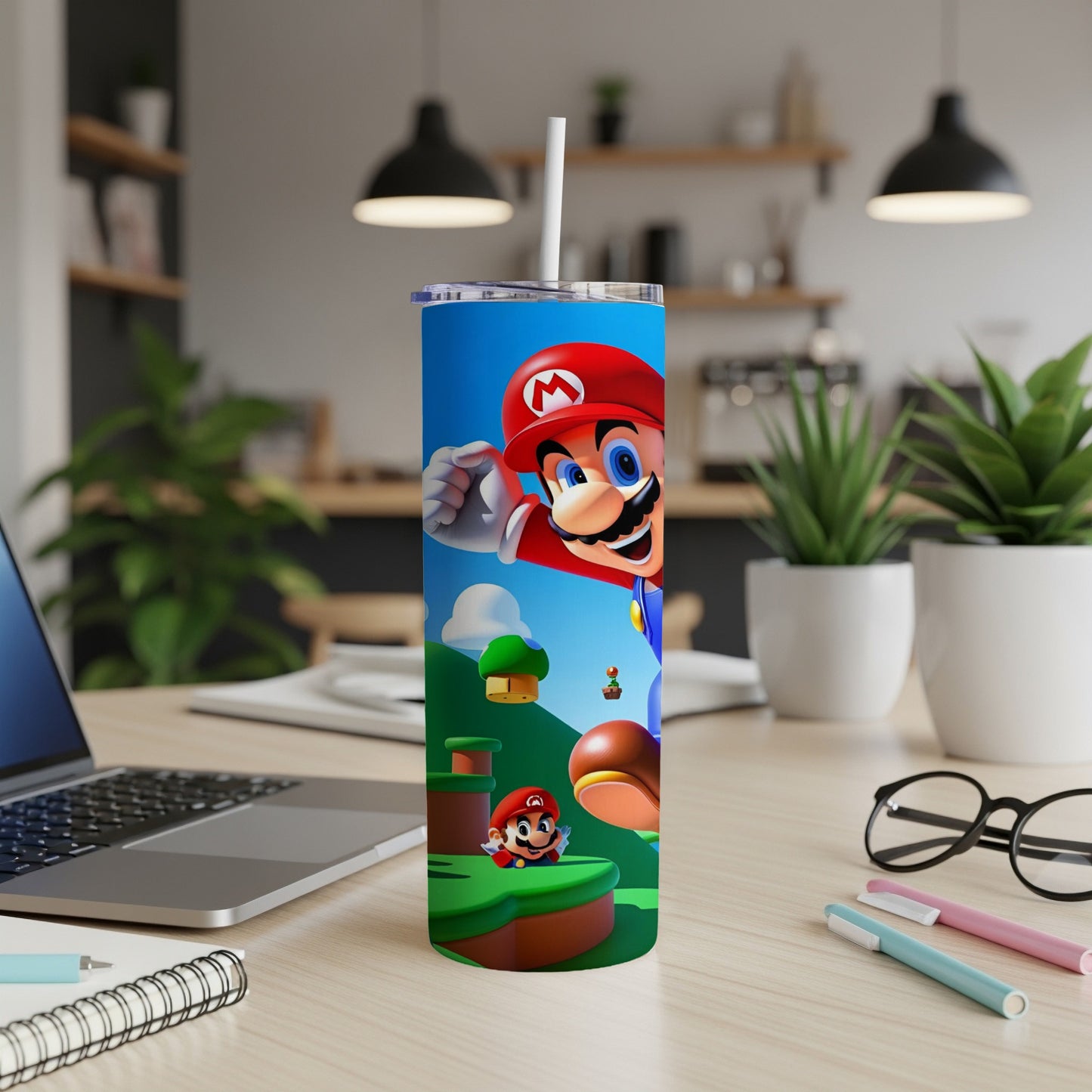 Mario character on a blue tumbler with green platforms and white straw.