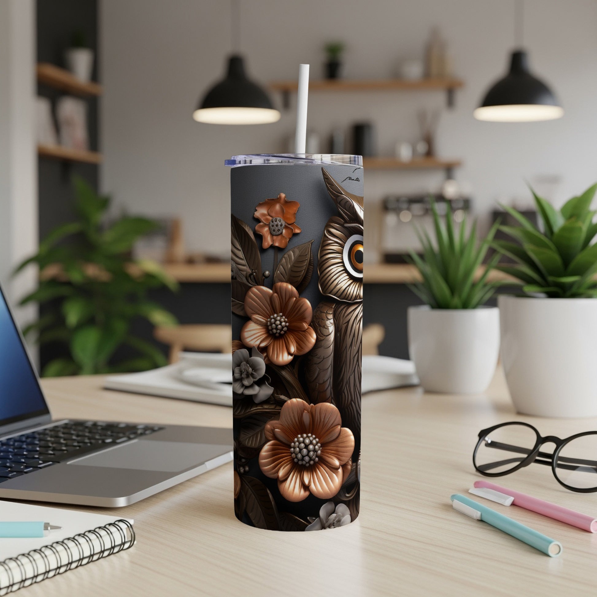 Brown and bronze owl with floral accents on a tumbler.