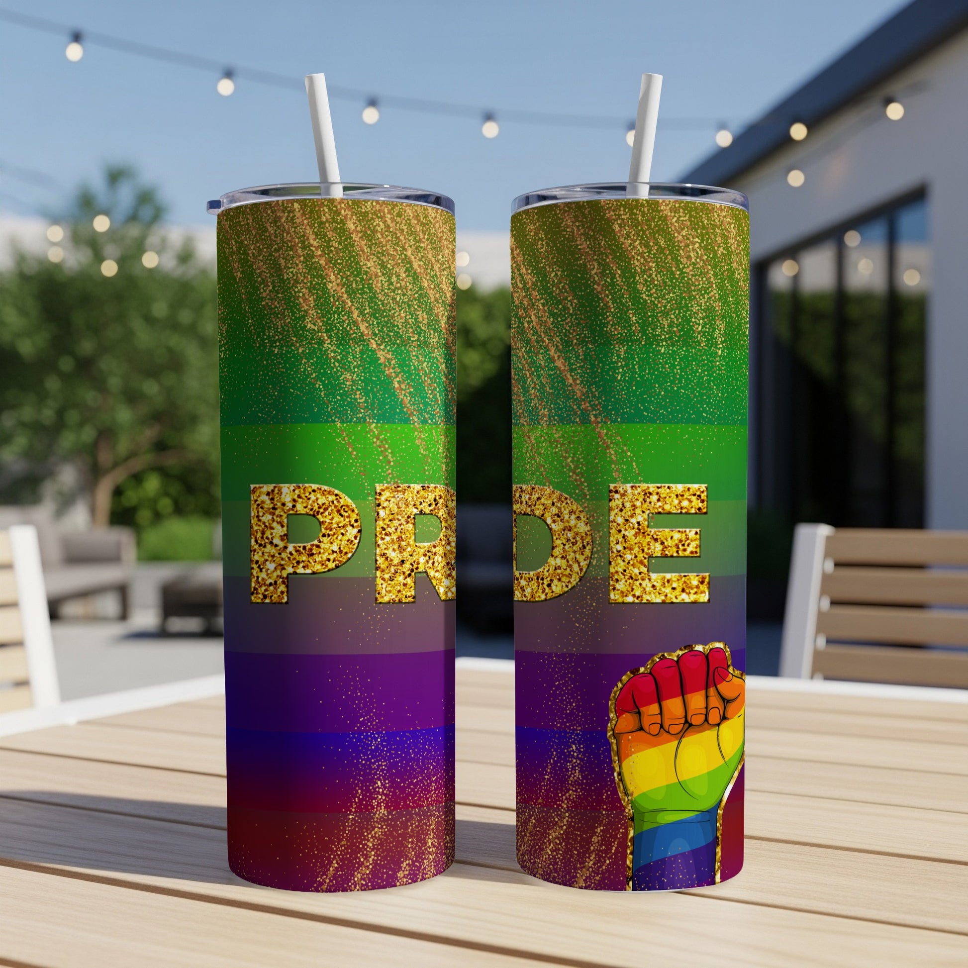 Rainbow gradient tumbler with "Pride" text and raised fist with rainbow flag colors.