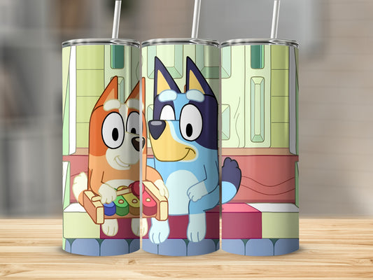 Bandit and Bluey Heeler characters holding a xylophone on a tumbler.