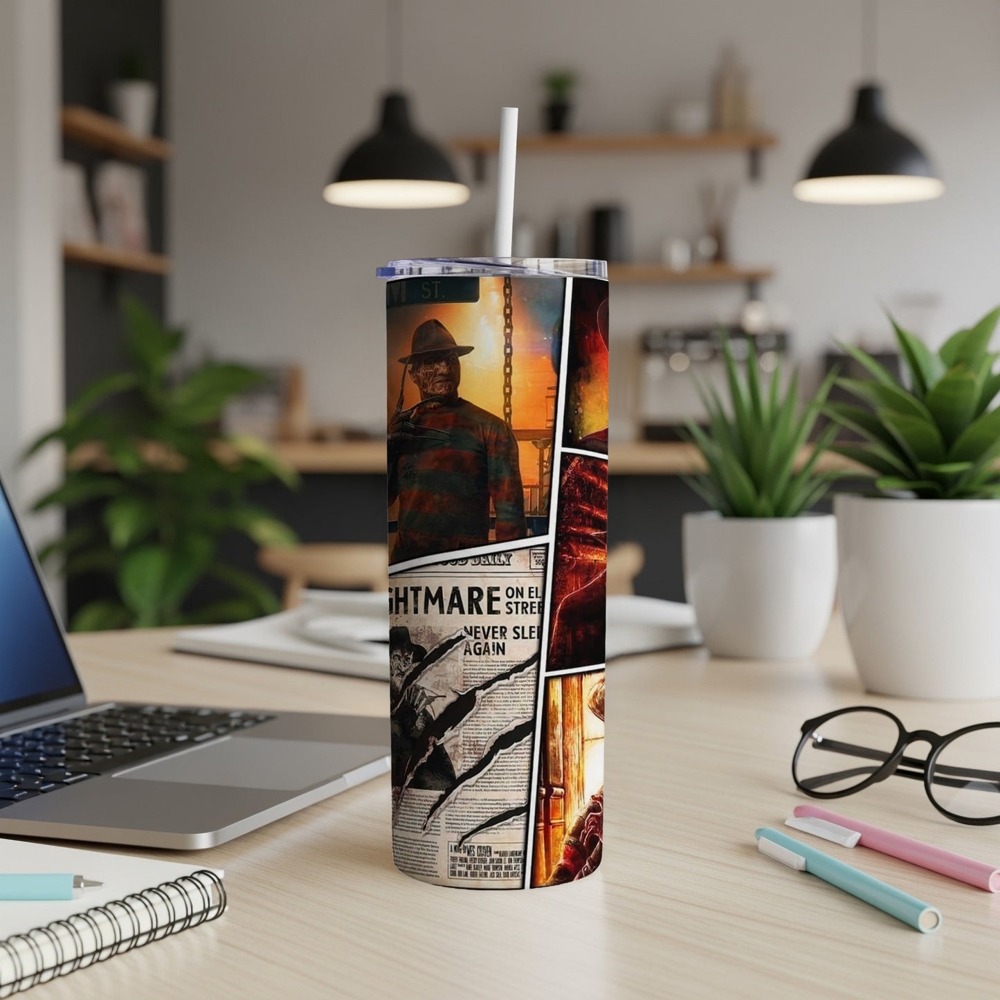 Tumbler with Freddy Krueger and "Nightmare on Elm Street" newspaper design.