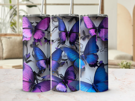 Three tumblers with a purple and blue butterfly design.