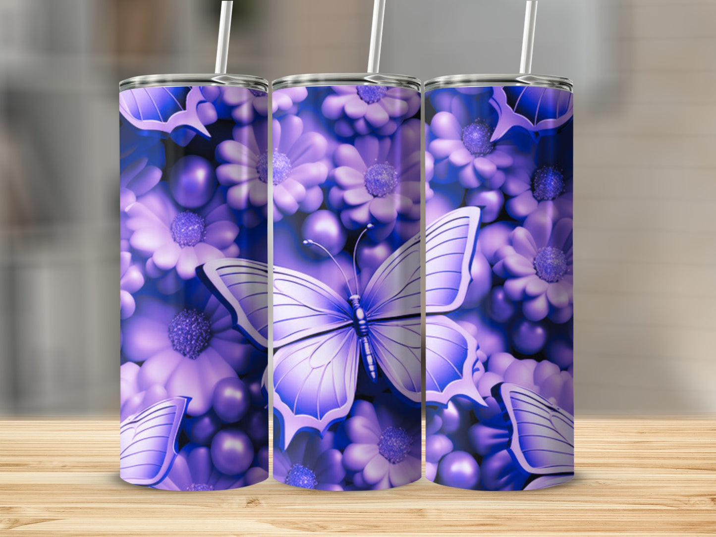 Purple butterfly and floral design on three tumblers.
