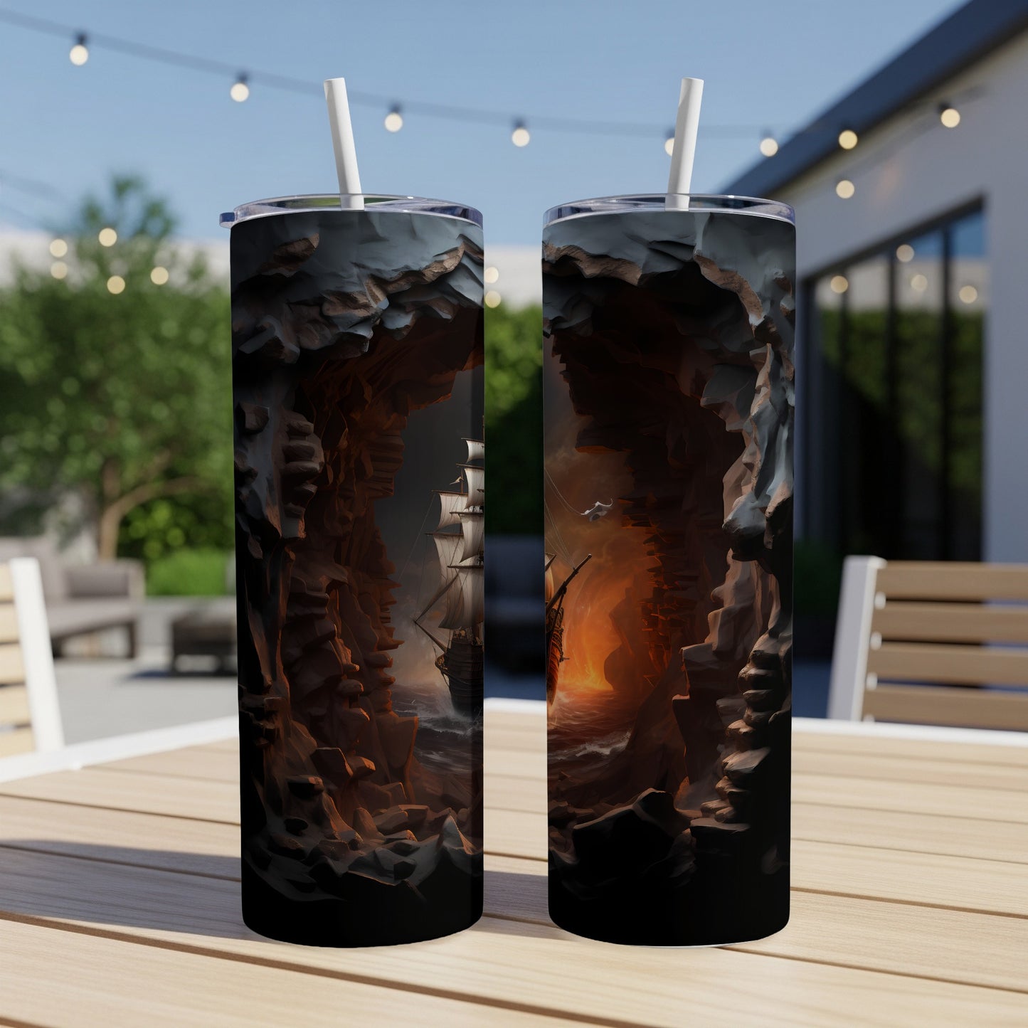 Pirate ship emerges from a fiery cave, with two tumblers displaying the artwork.