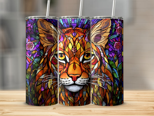 Stained glass bobcat tumbler with floral background.