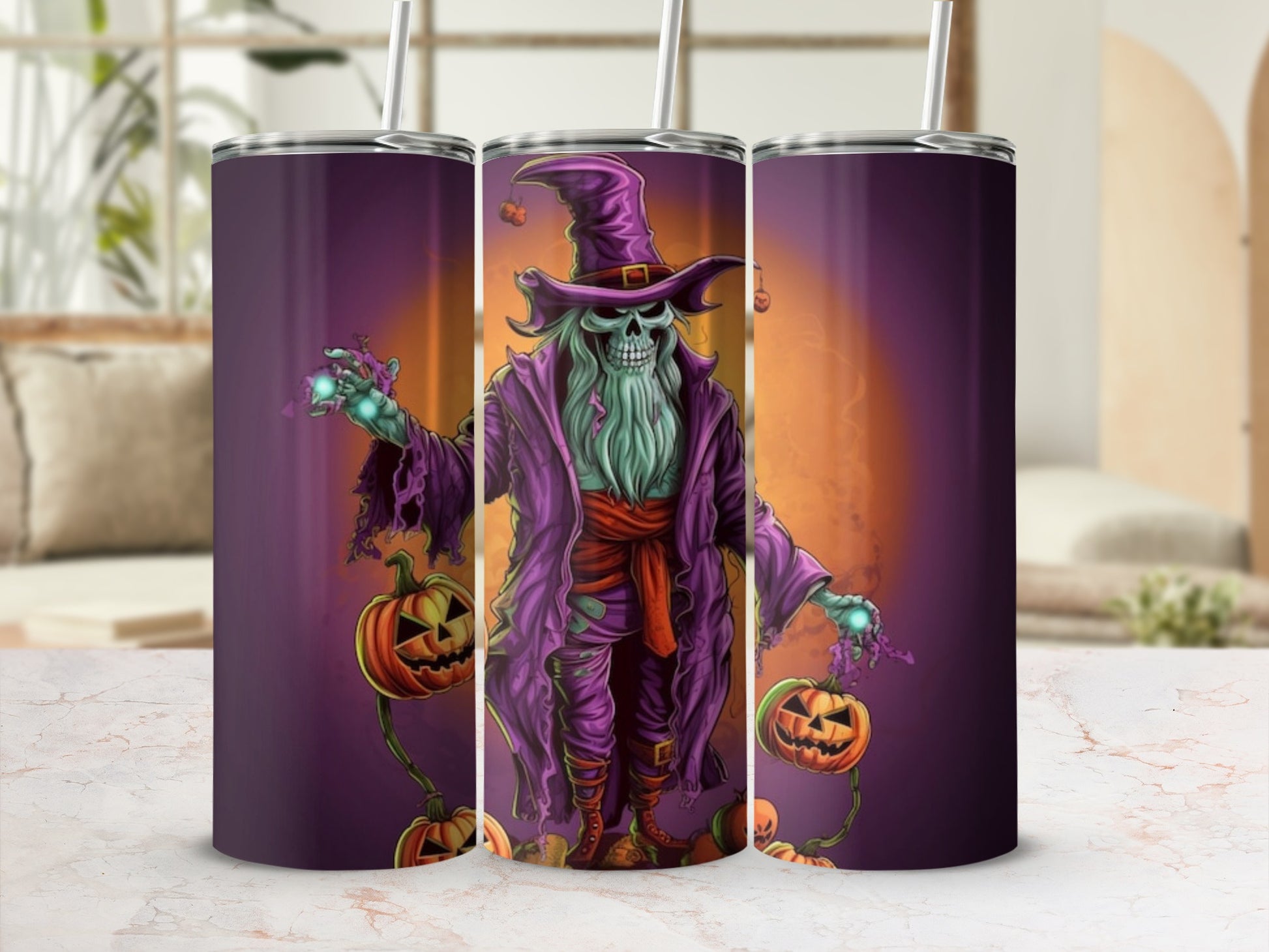 Halloween tumbler with skeleton wizard and jack-o'-lanterns.