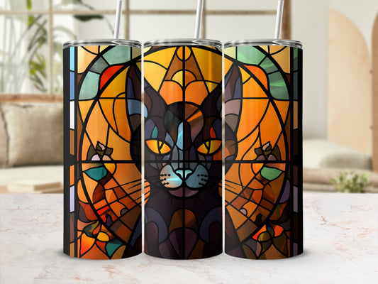 Black cat stained glass design on a tumbler with straw.