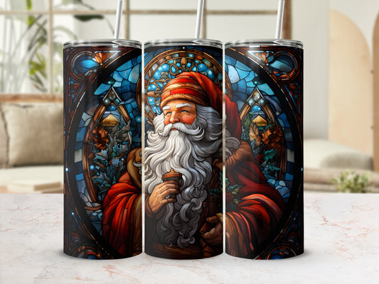 Santa Claus in stained glass pattern on a tumbler with a straw.