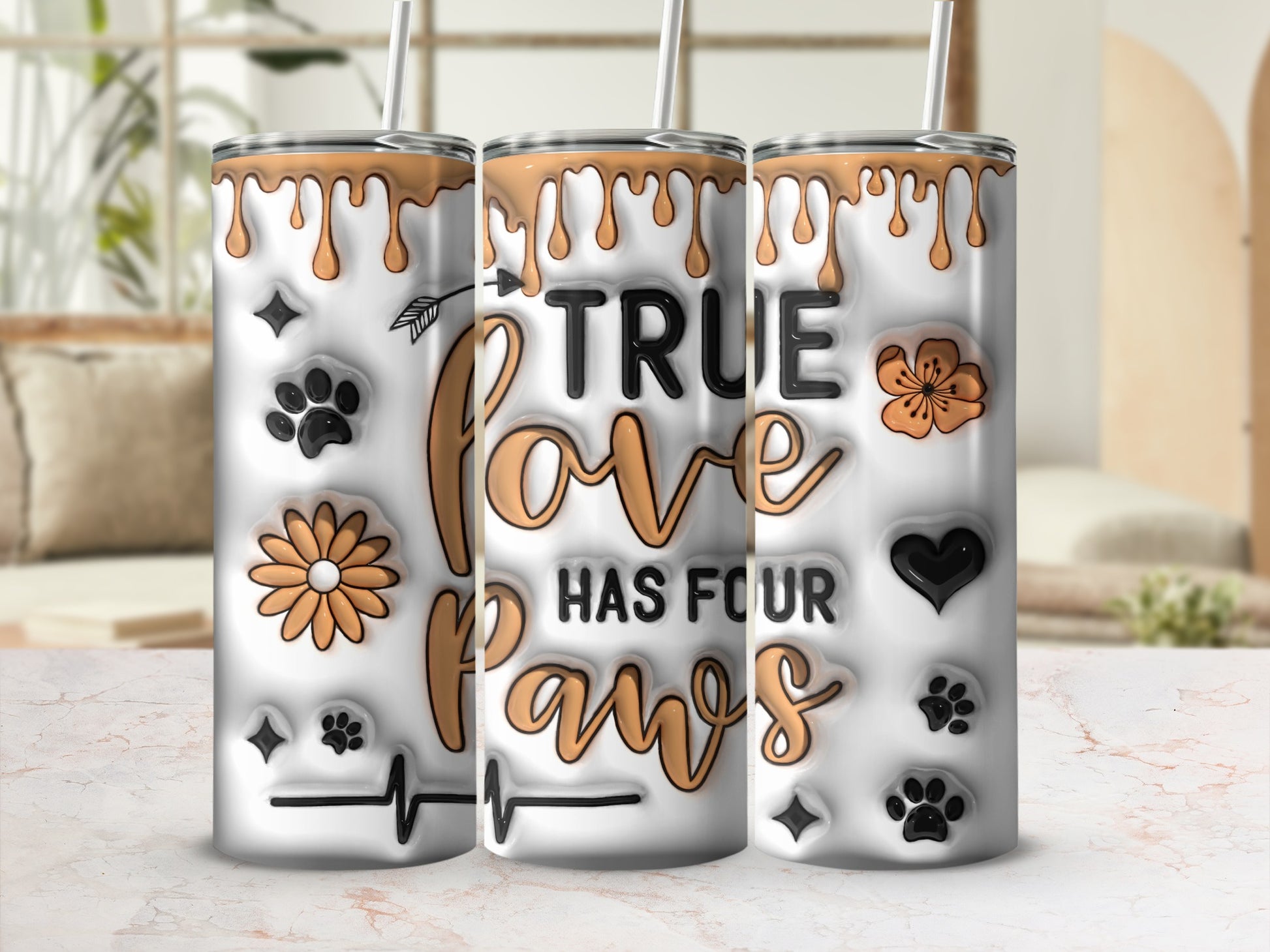 Tumbler with "True Love Has Four Paws" text and paw print, flower, and heart designs.