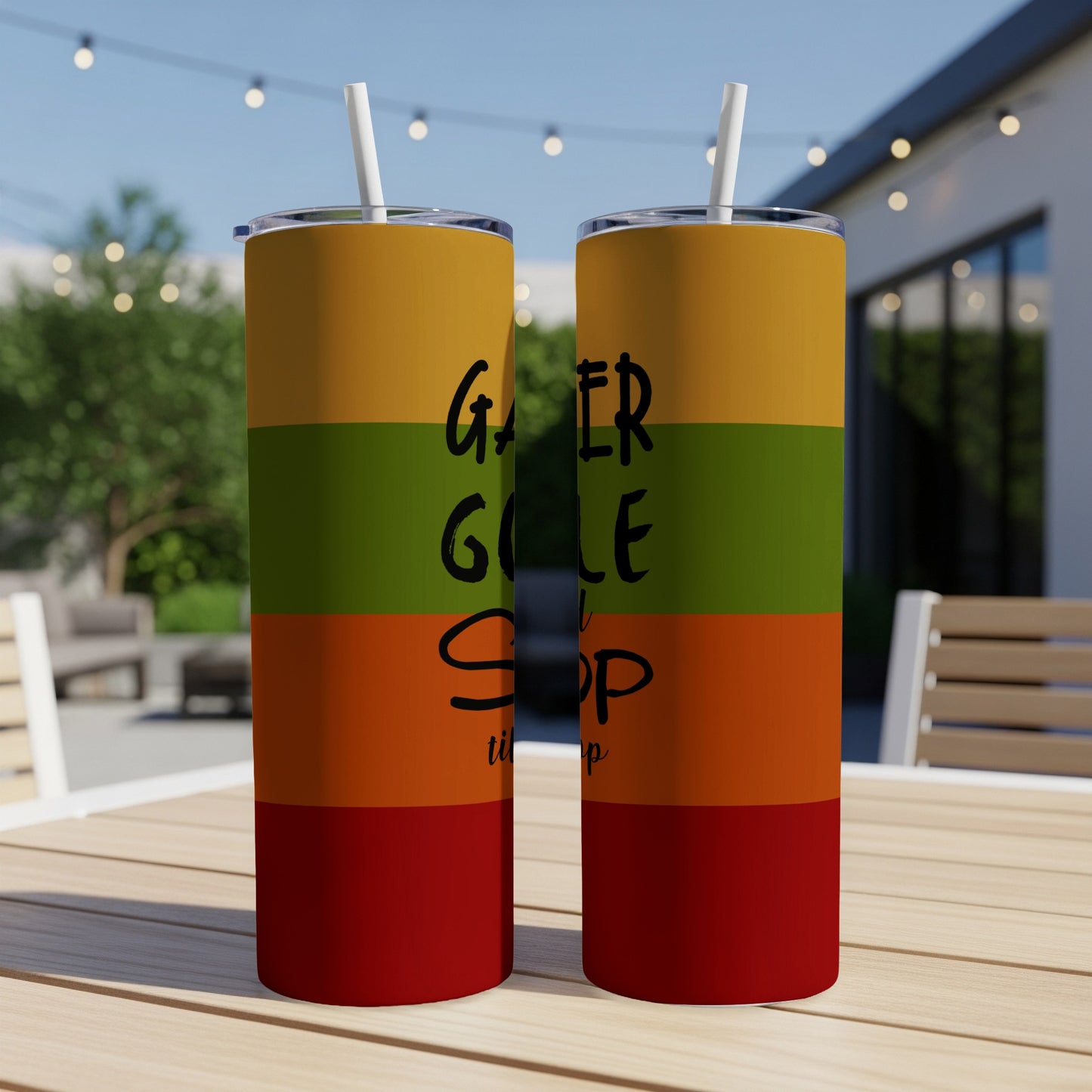 Two tumblers with "Gamer, Golfer, Stop" text on striped background.