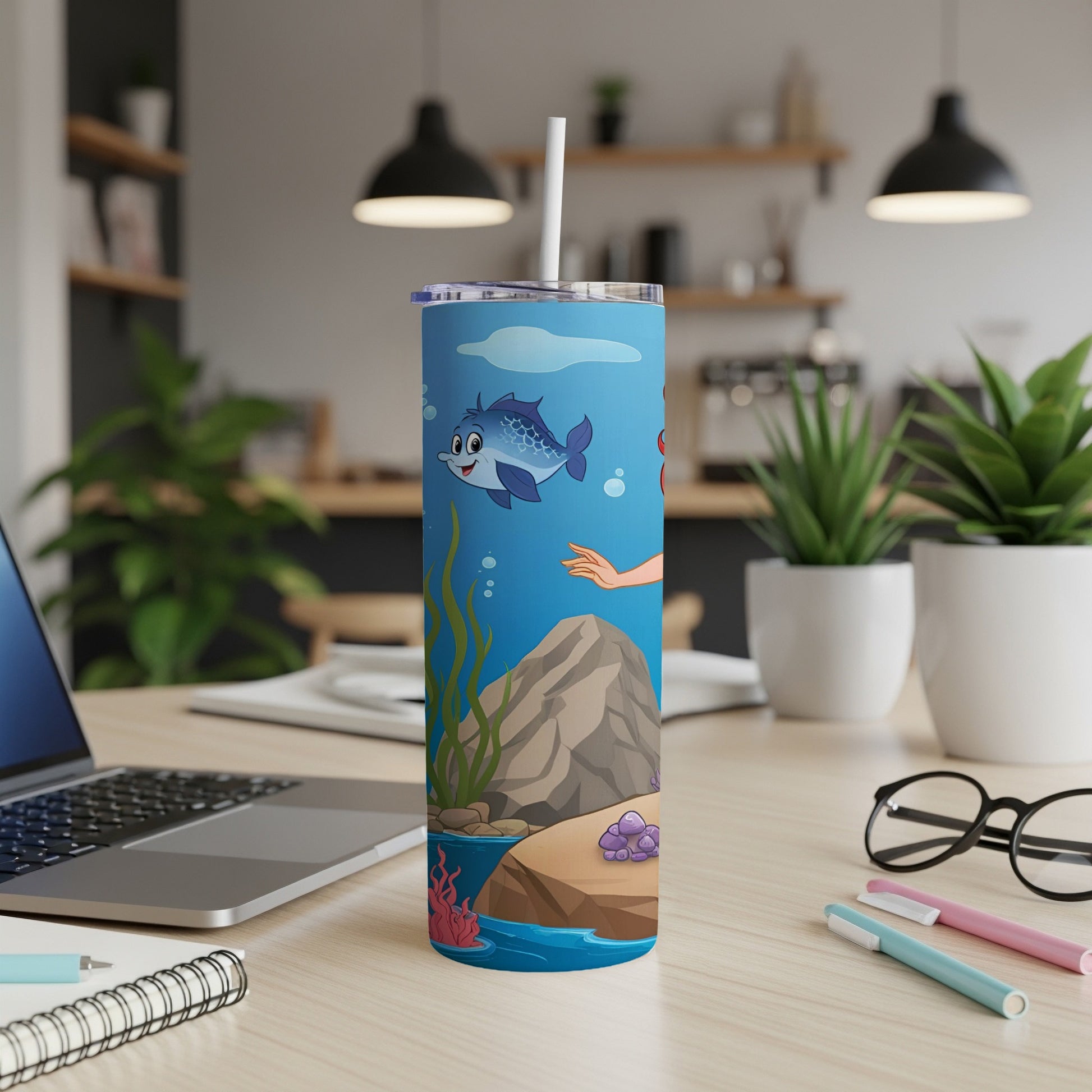 Blue cartoon fish and mermaid tail on a underwater scene tumbler.