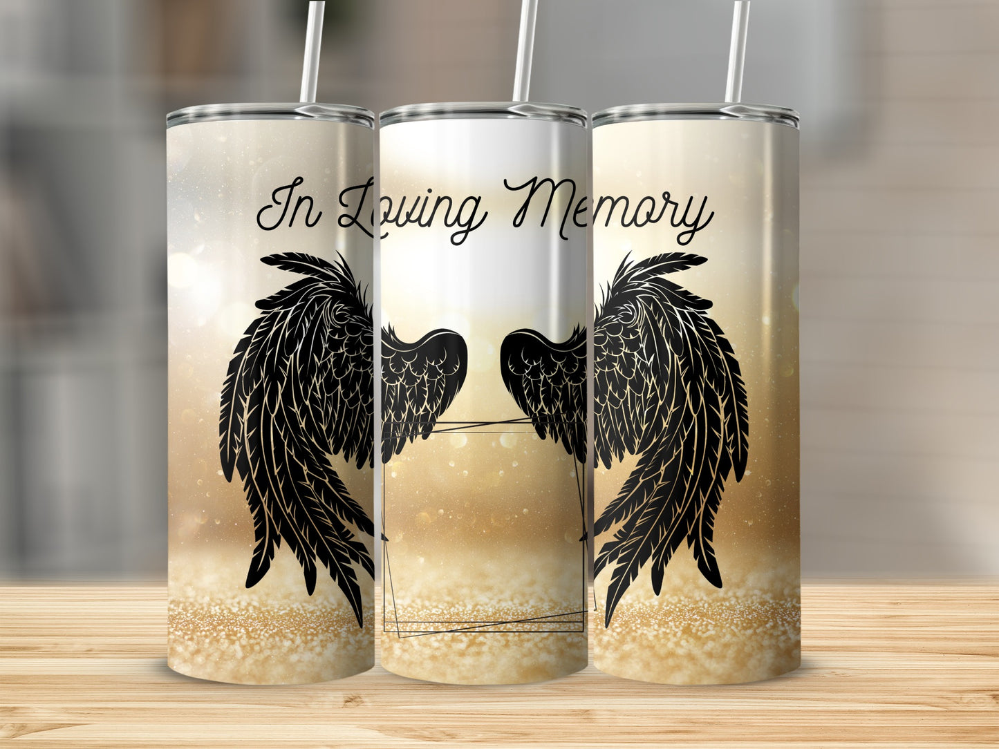 Three tumblers with "In Loving Memory" text and black angel wings.