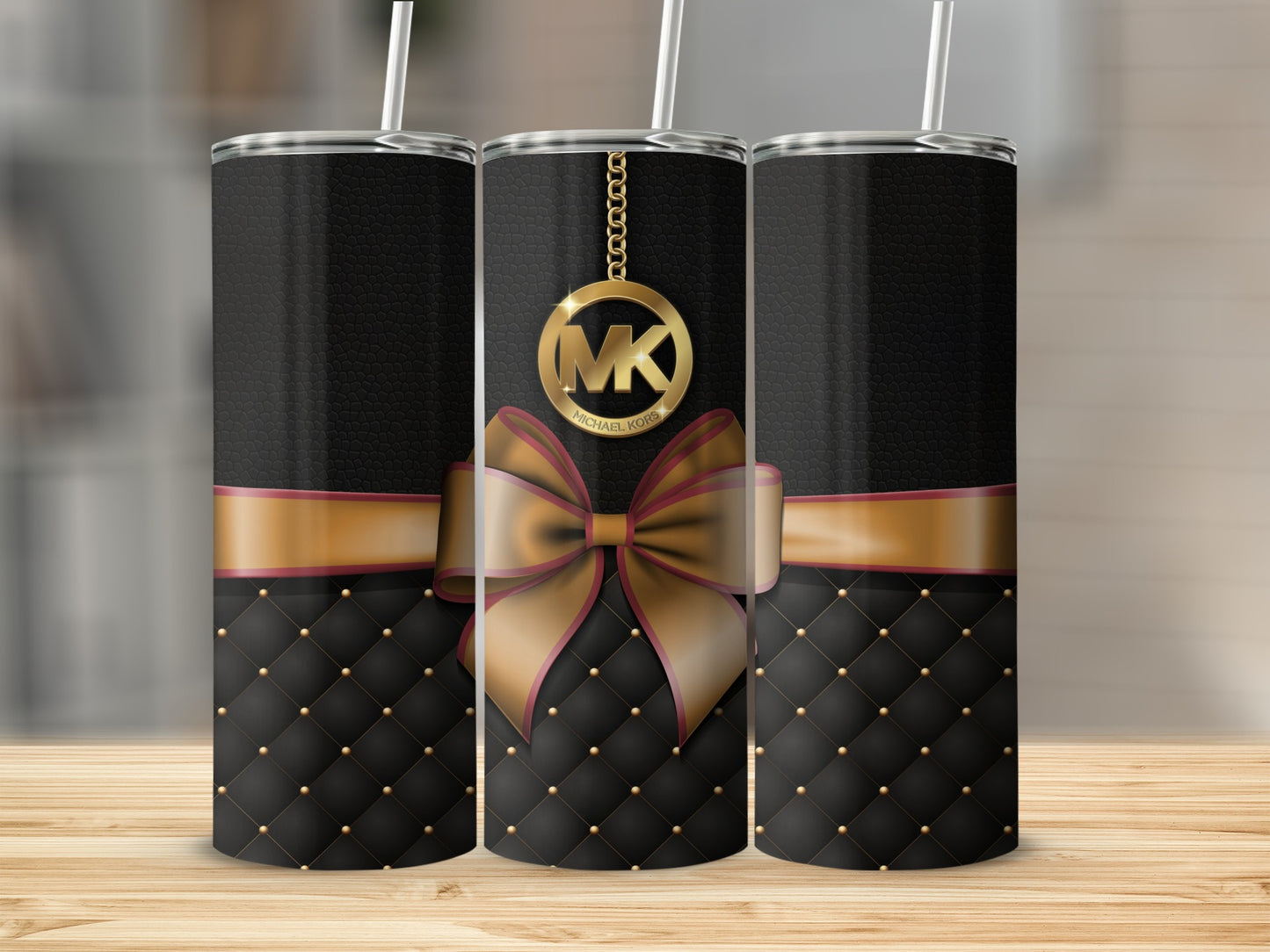 Elegant Black Tumbler with Gold Ribbon Pattern Design
