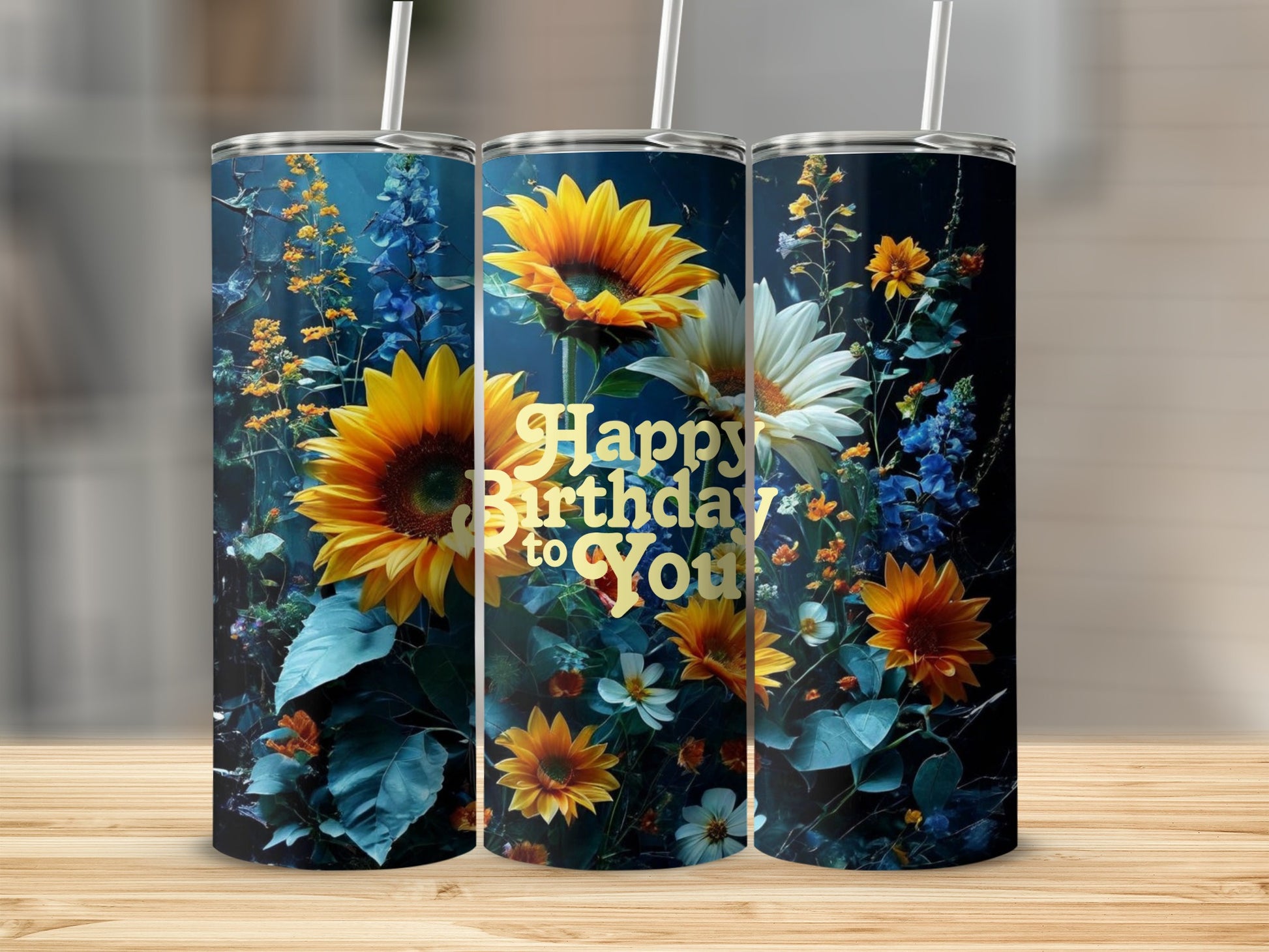 Happy Birthday to You text on three tumblers with floral designs.