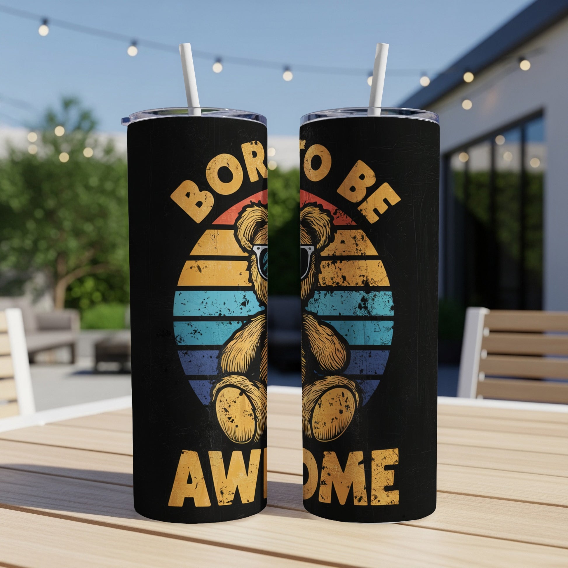 Teddy bear with sunglasses on vintage sunset background, "Born to be Awesome" text.