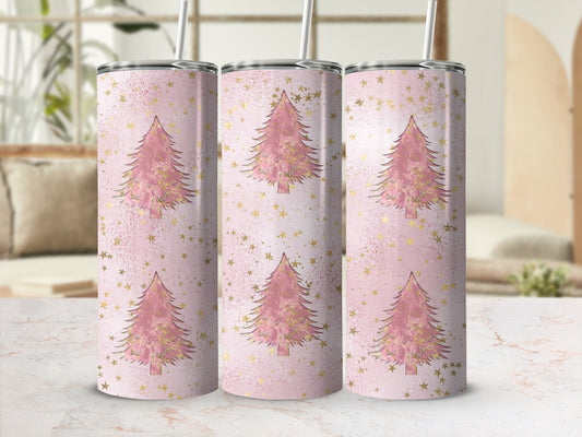 Pink Christmas tree pattern on a skinny tumbler with gold stars.