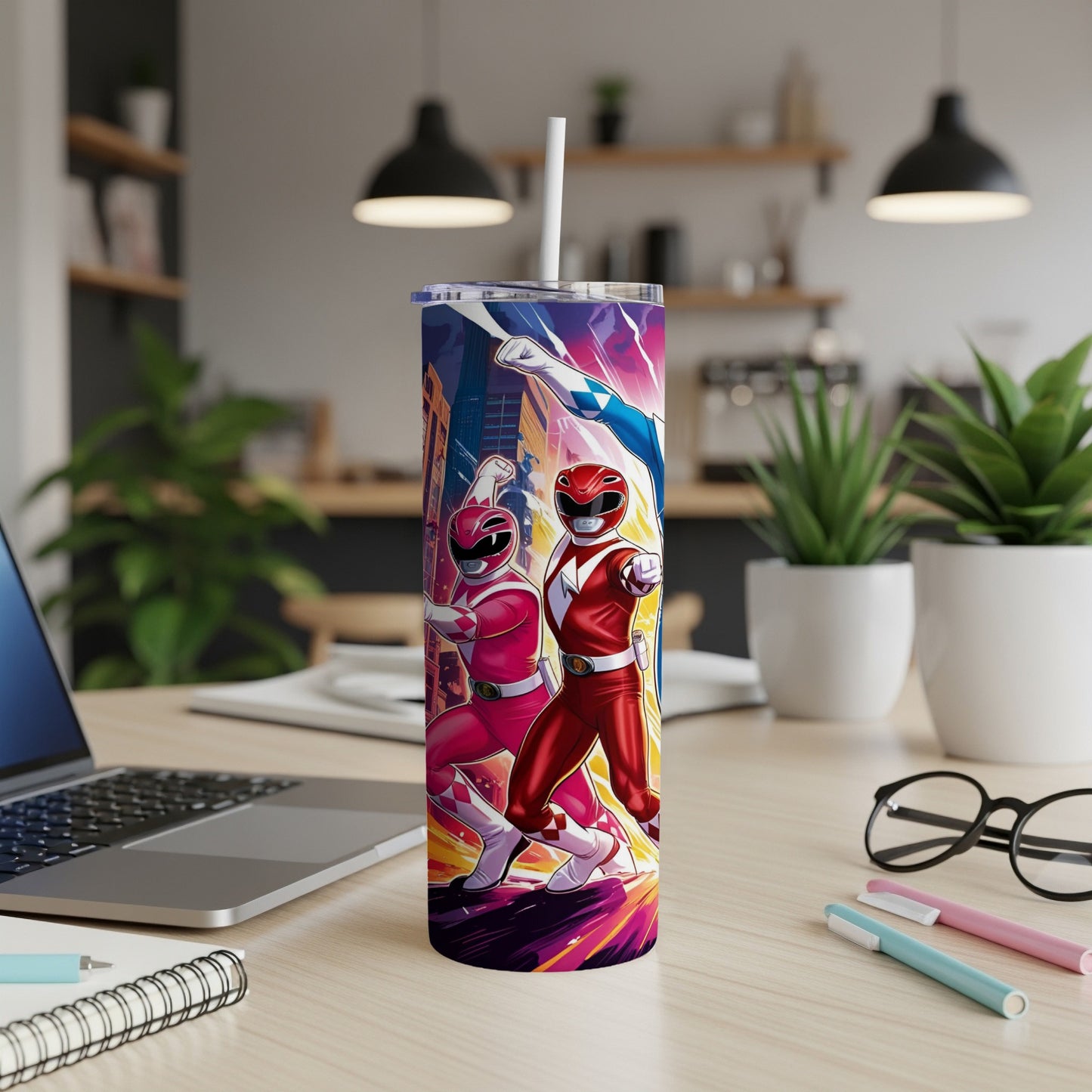 Pink and red Power Rangers stand against a city skyline on a tumbler.