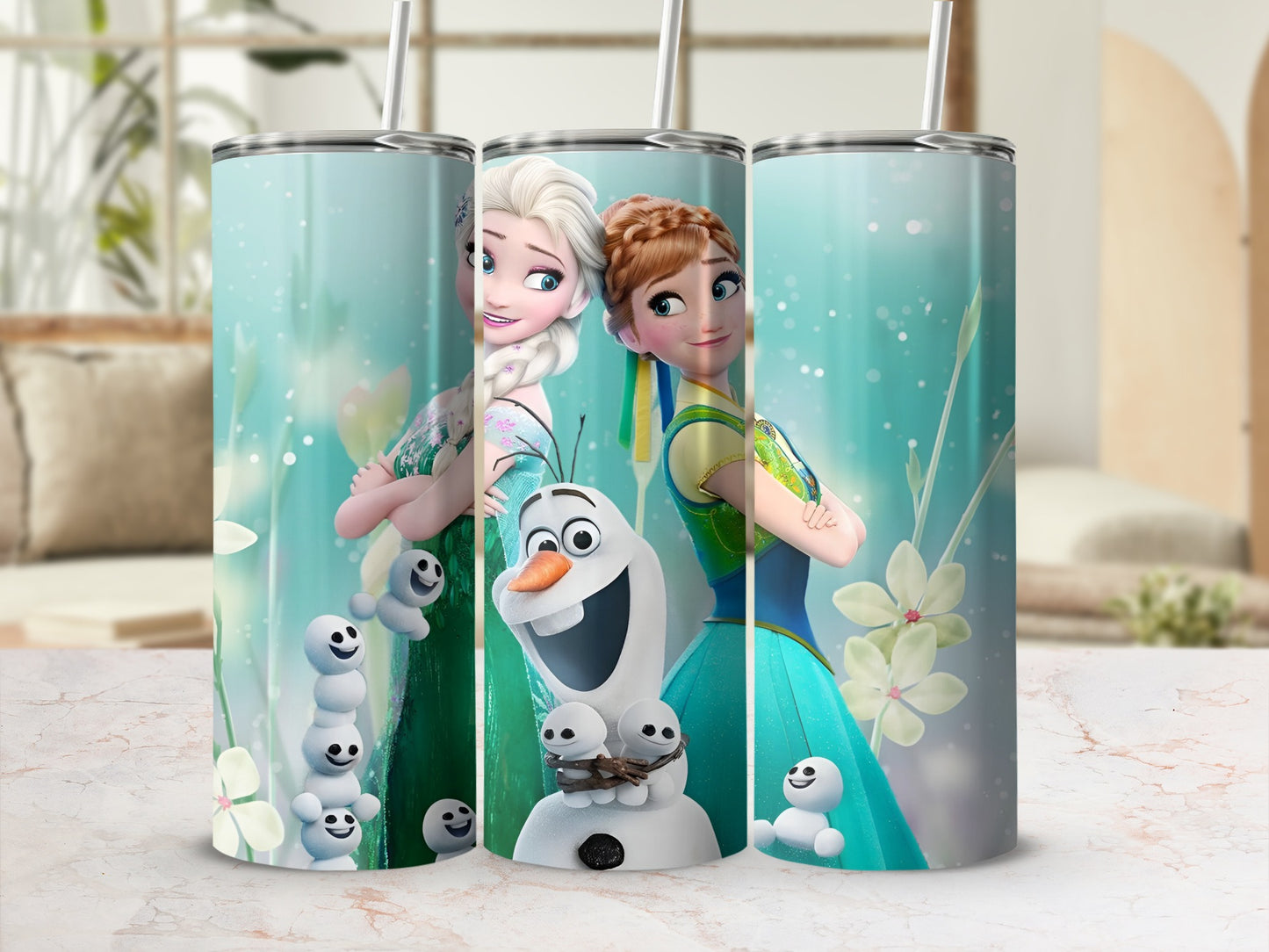 Elsa and Anna from Frozen with Olaf on a blue tumbler.