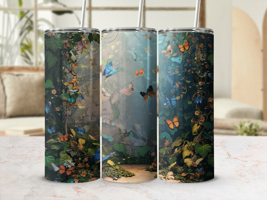 Misty forest scene with vibrant butterflies and climbing vines wraps around a tumbler.