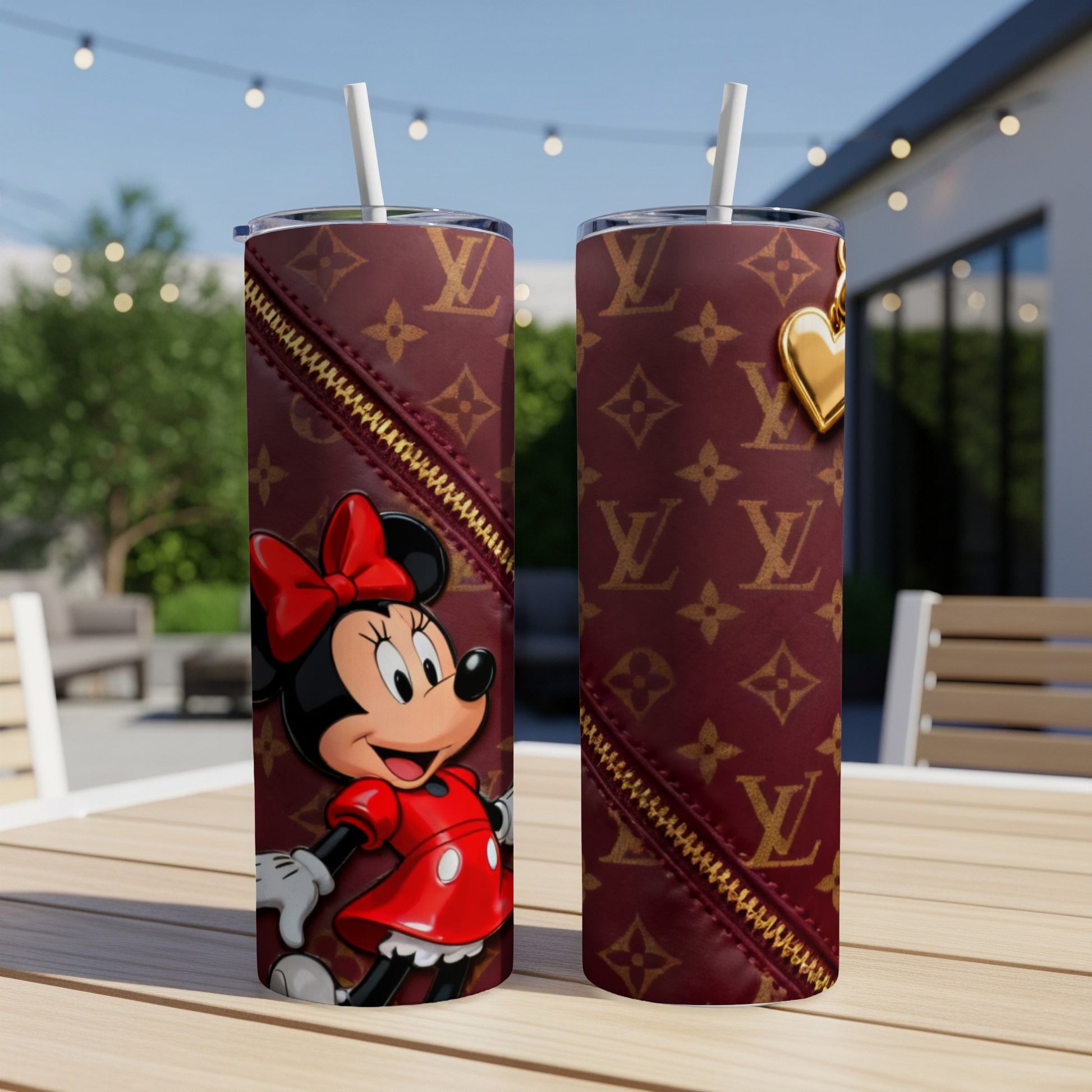 Minnie Mouse in red dress on LV monogram tumbler with gold zipper detail.