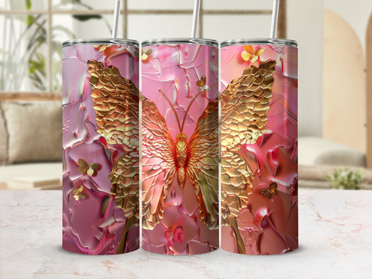 Pink tumbler with textured gold butterfly design.