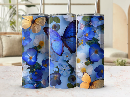 Blue and yellow butterflies with blue and white flowers adorn a tumbler.