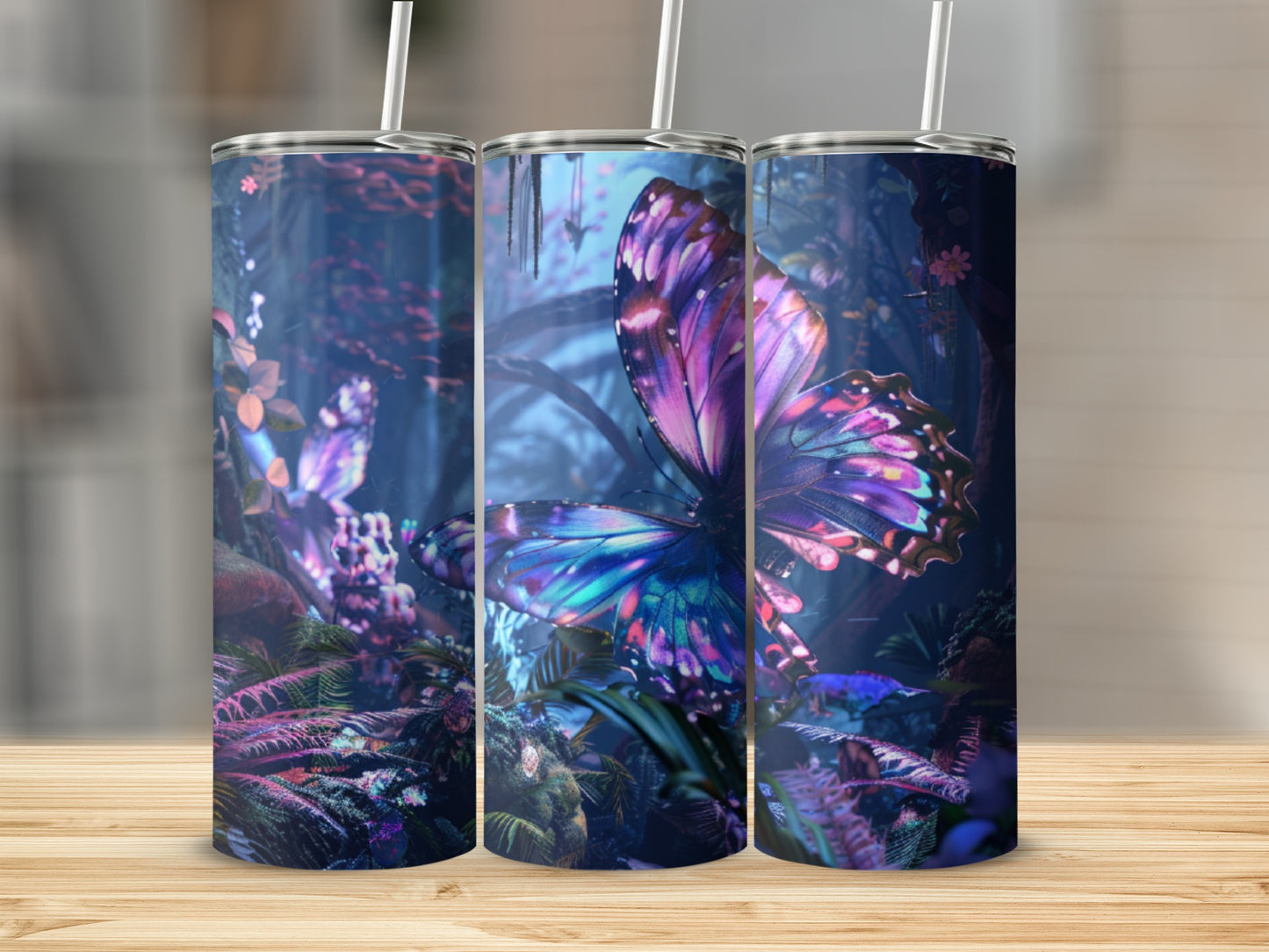 Three tumblers with a vibrant butterfly and floral design.
