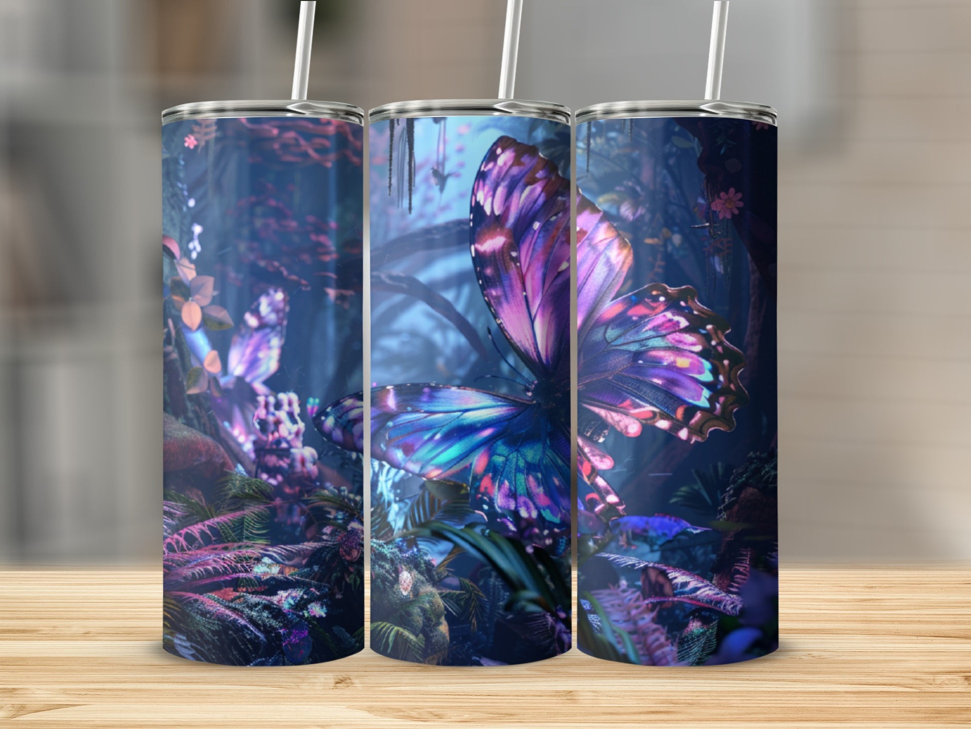 Three tumblers with a vibrant butterfly and floral design.