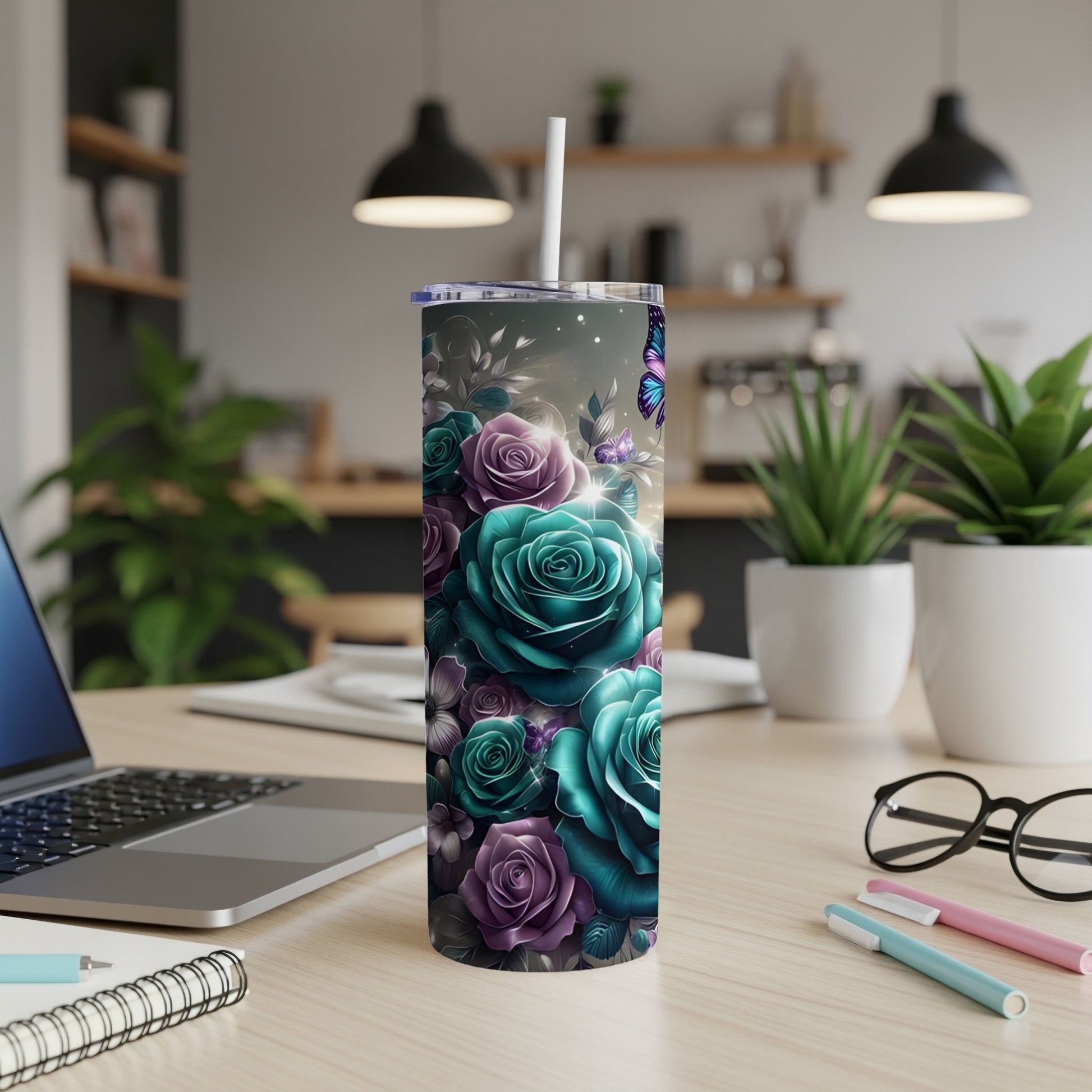 Tumbler with teal and purple roses and butterfly design.