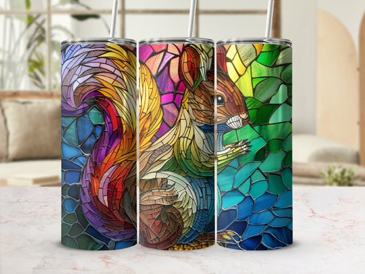 Squirrel stained glass design on three tumblers with straws.