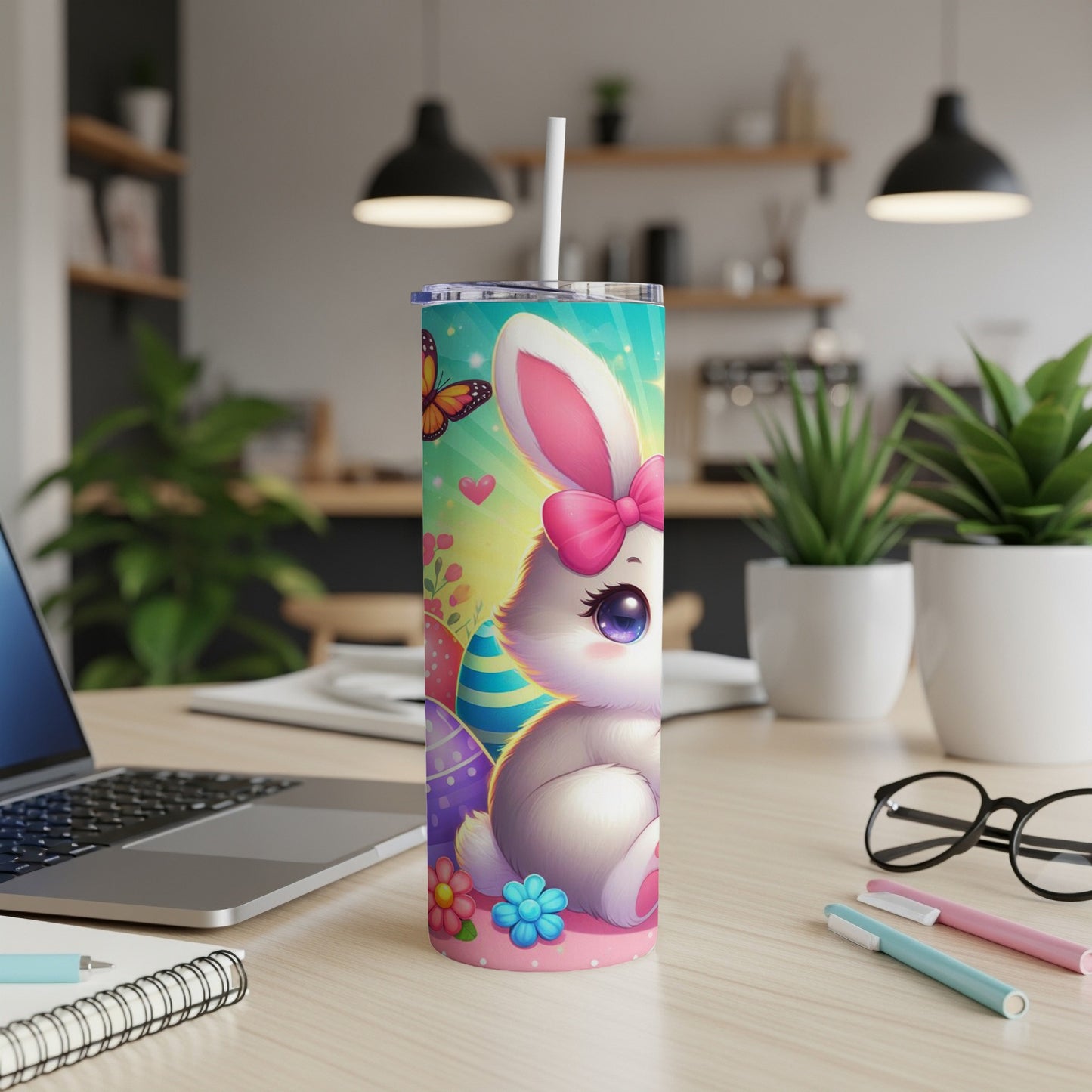 Easter bunny with colorful eggs and butterflies on a tumbler.