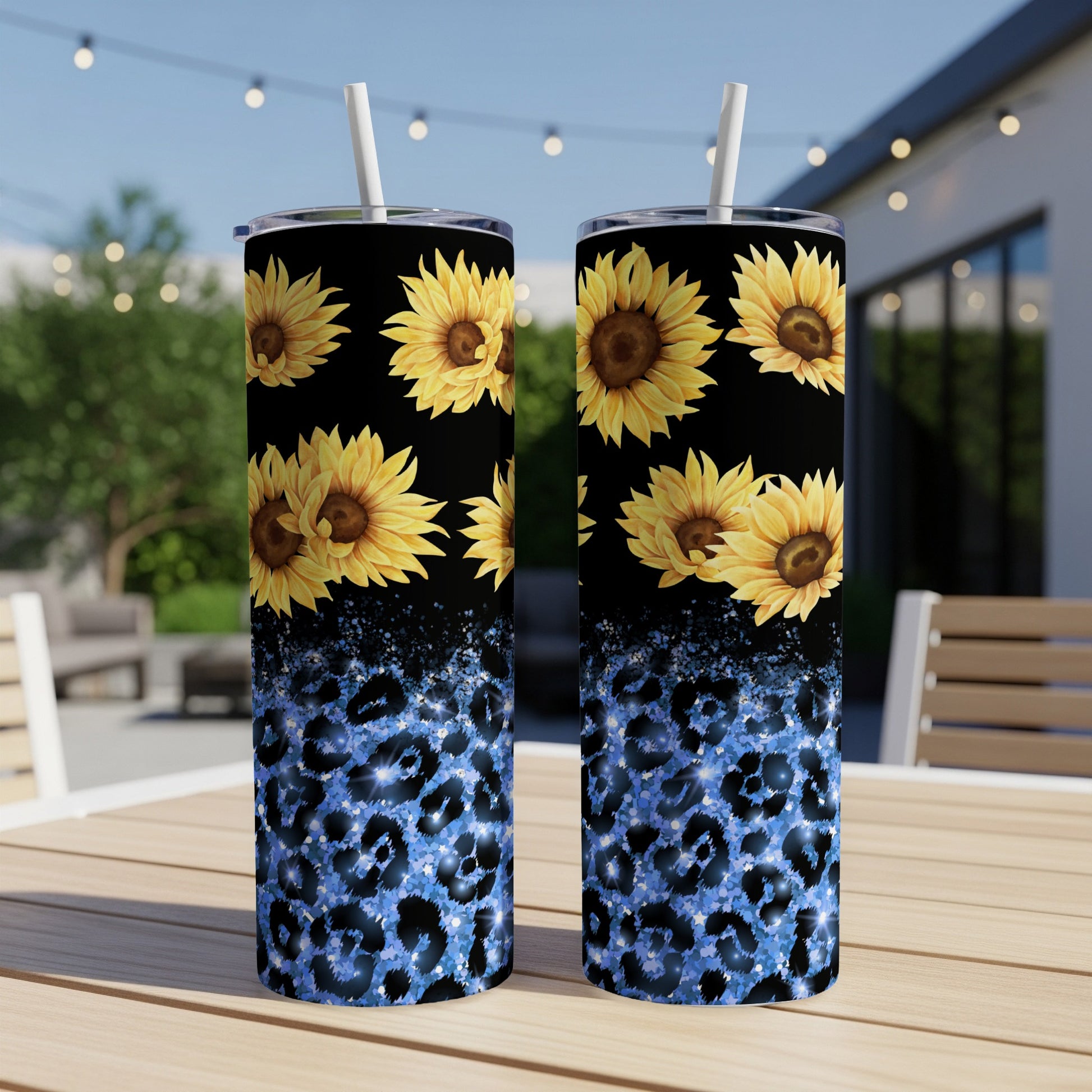 Two tall tumblers with sunflowers and blue leopard print.