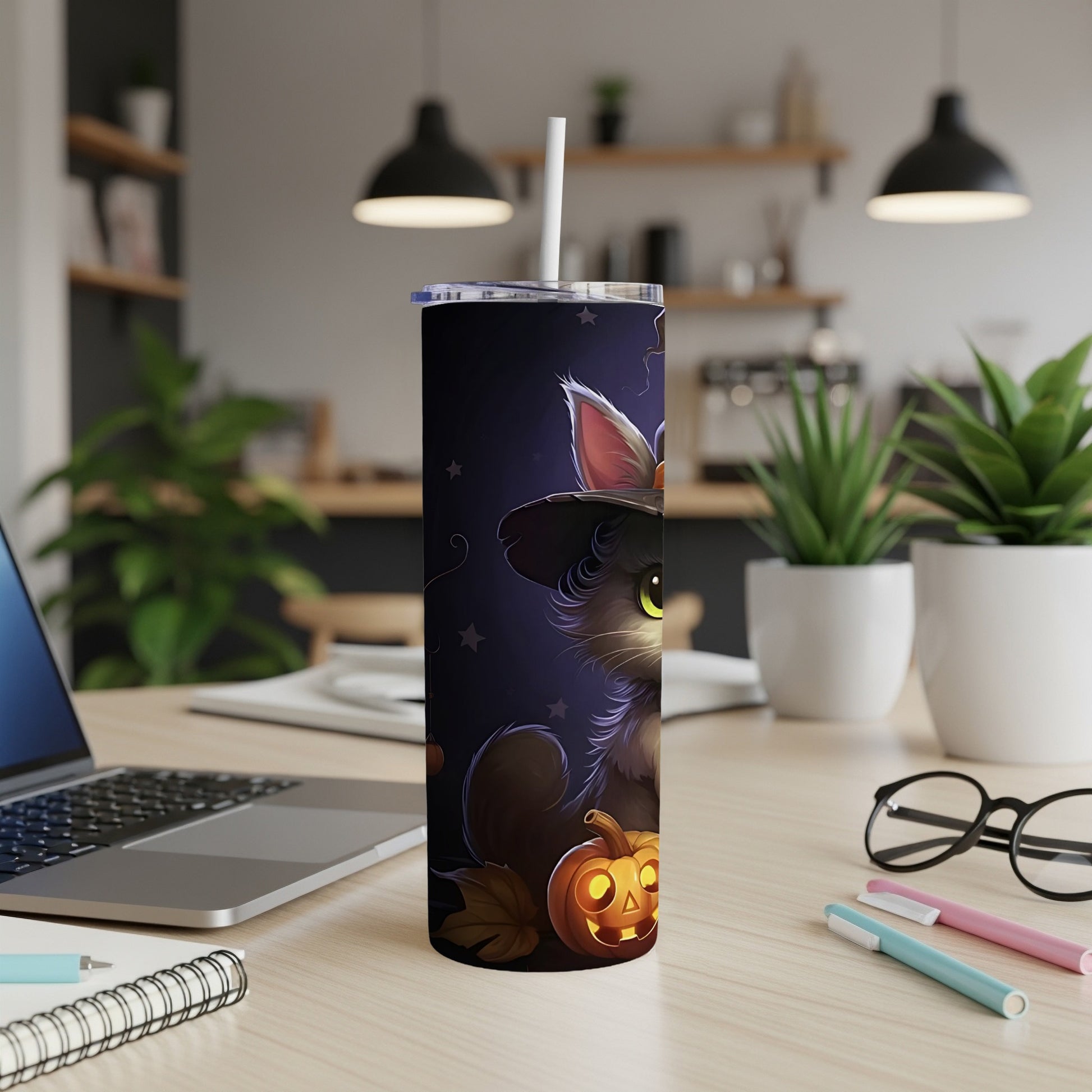 Tumbler with black cat wearing witch hat and jack-o'-lantern design.