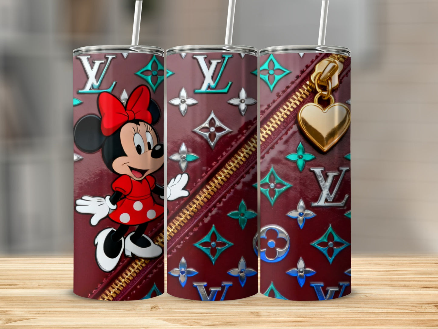 Minnie Mouse on a dark red tumbler with LV-inspired pattern and gold zipper.