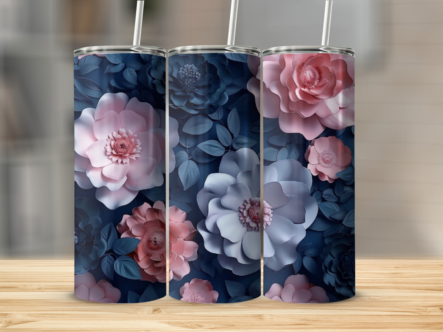 Three tumblers with dark blue floral pattern and light pink accents.