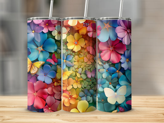 Three tumblers featuring vibrant floral and butterfly patterns.