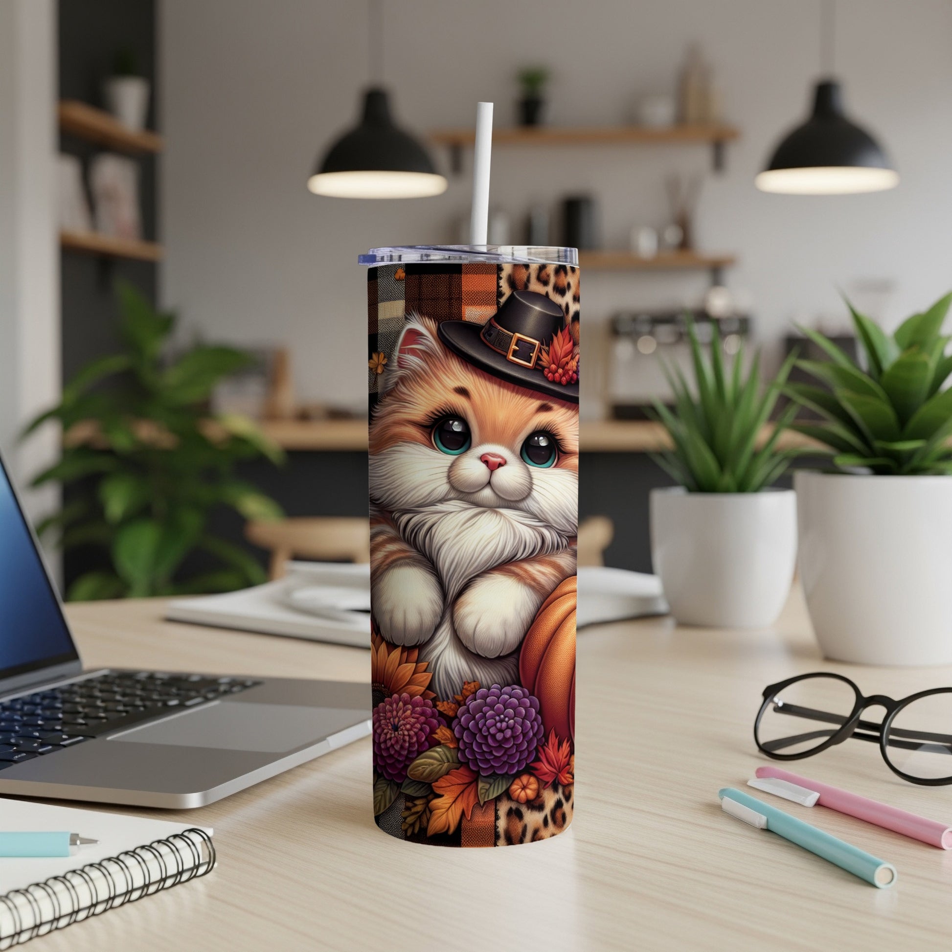 Cute cartoon cat wearing a hat and holding a pumpkin on a tumbler.