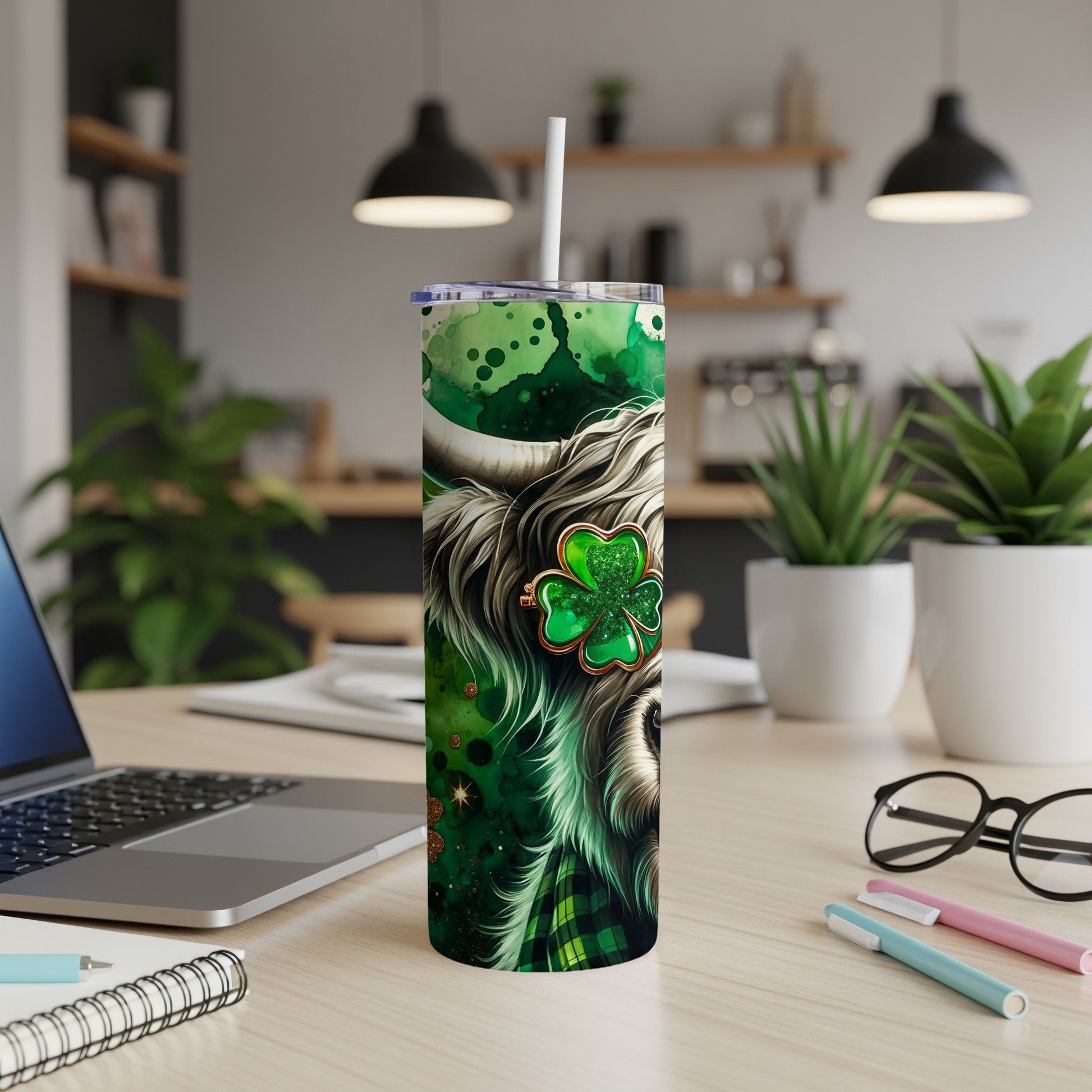 Green highland cow tumbler with shamrock and plaid design.