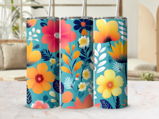 Teal tumbler with colorful floral pattern and white background.