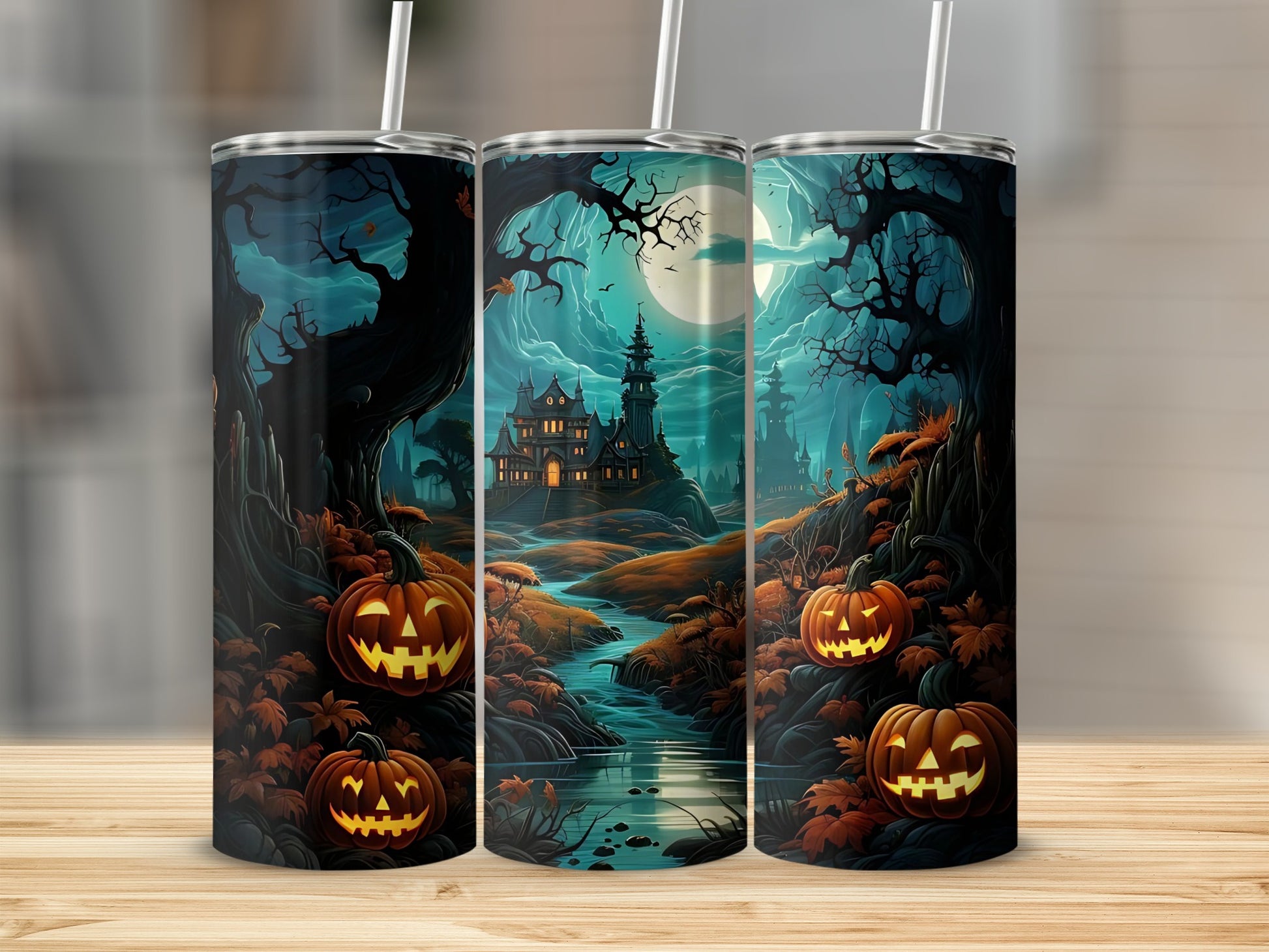 Three tumblers with a spooky Halloween landscape featuring a haunted house and pumpkins.