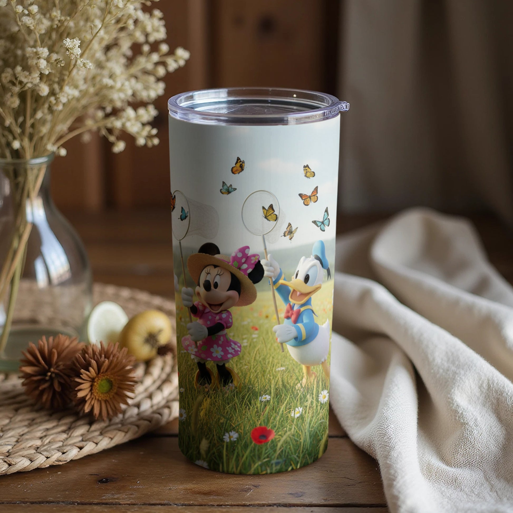 Minnie and Donald Butterfly Adventure Travel Mug